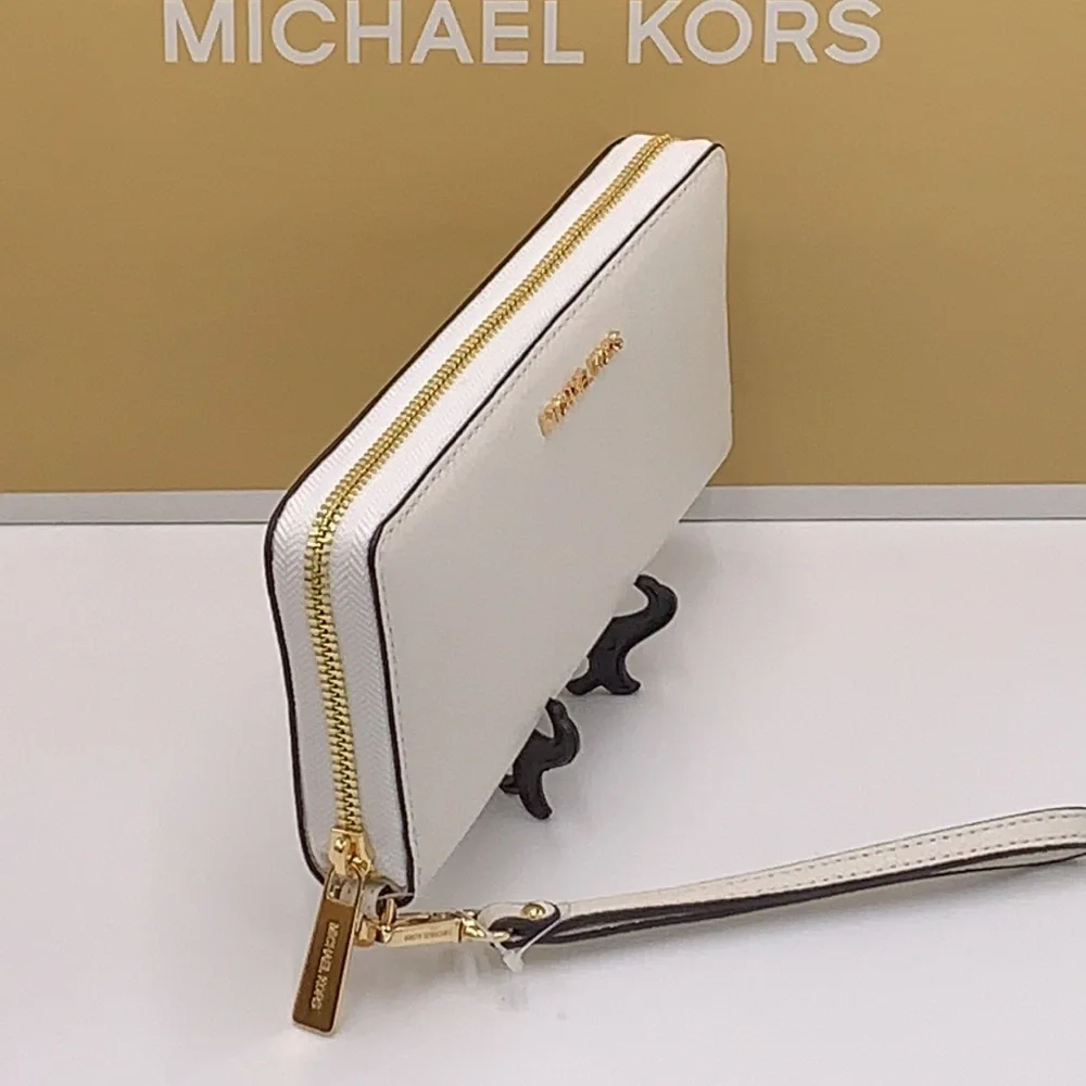 MICHAEL KORS LARGE TRAVEL CONTINENTAL WRISTLET WALLET PHONE OPTIC WHITE COLOR